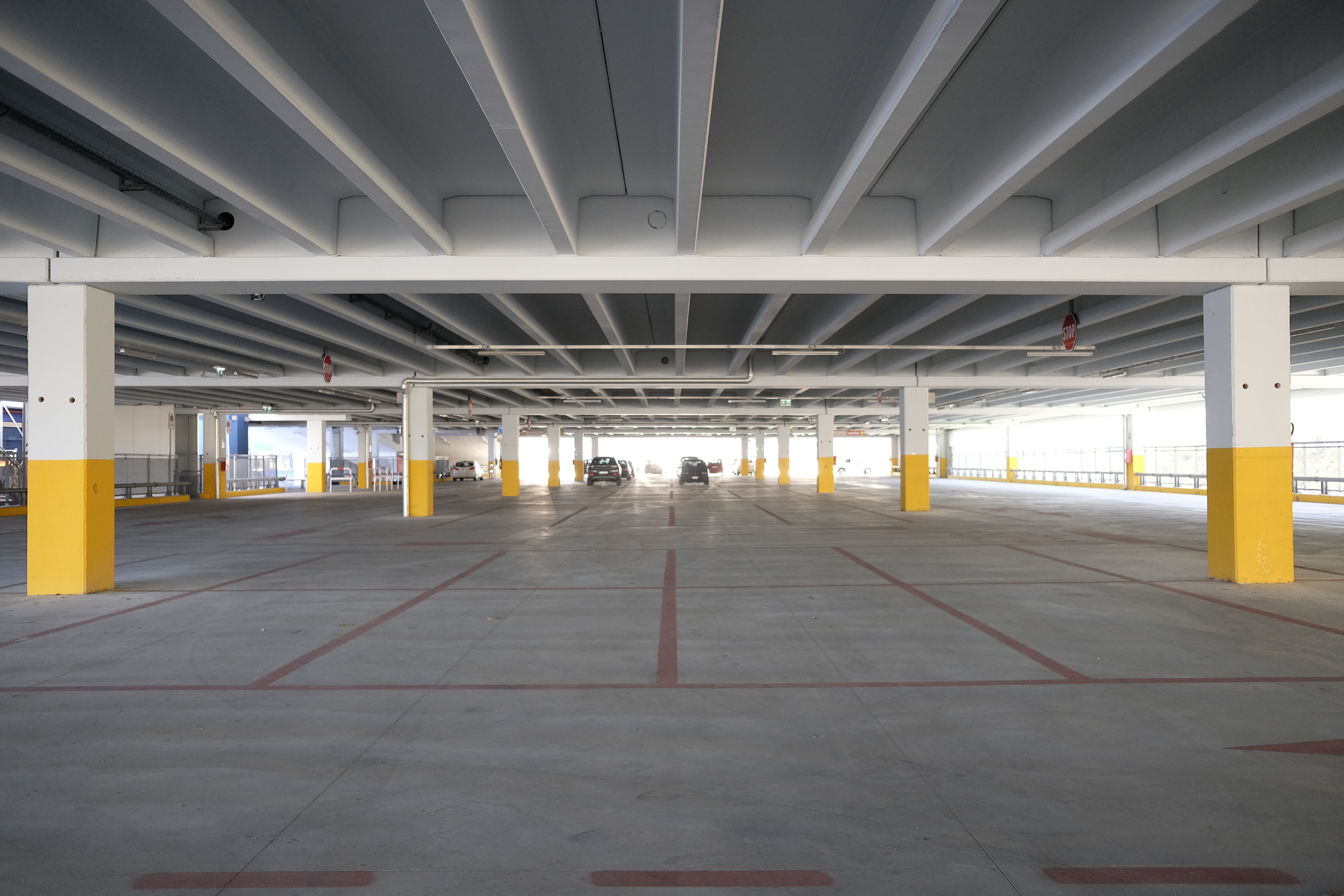 A large empty parking lot with no one in it.